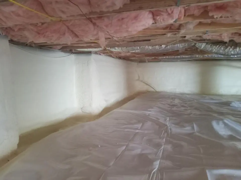 Crawl space encapsulation with closed-cell spray foam for Commercial Roof Restoration in Marlboro Village